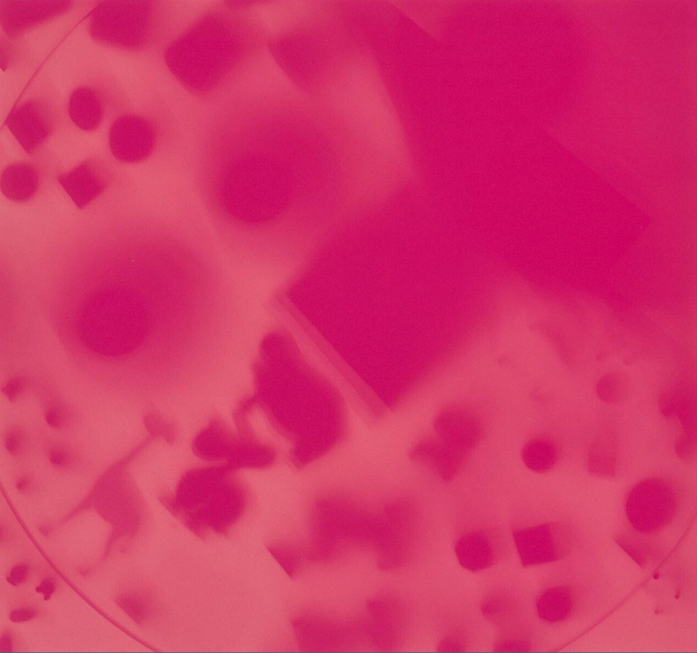 Nomadisch Werkstuk prt B, 1992 - scattered squares and circles blurred into a vivid magenta field.