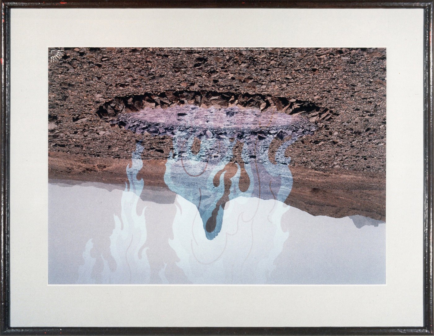 Salamanders in de Hogar, 1991 - a framed photograph: an inverted ring of pale flames and figures above a rocky ground.