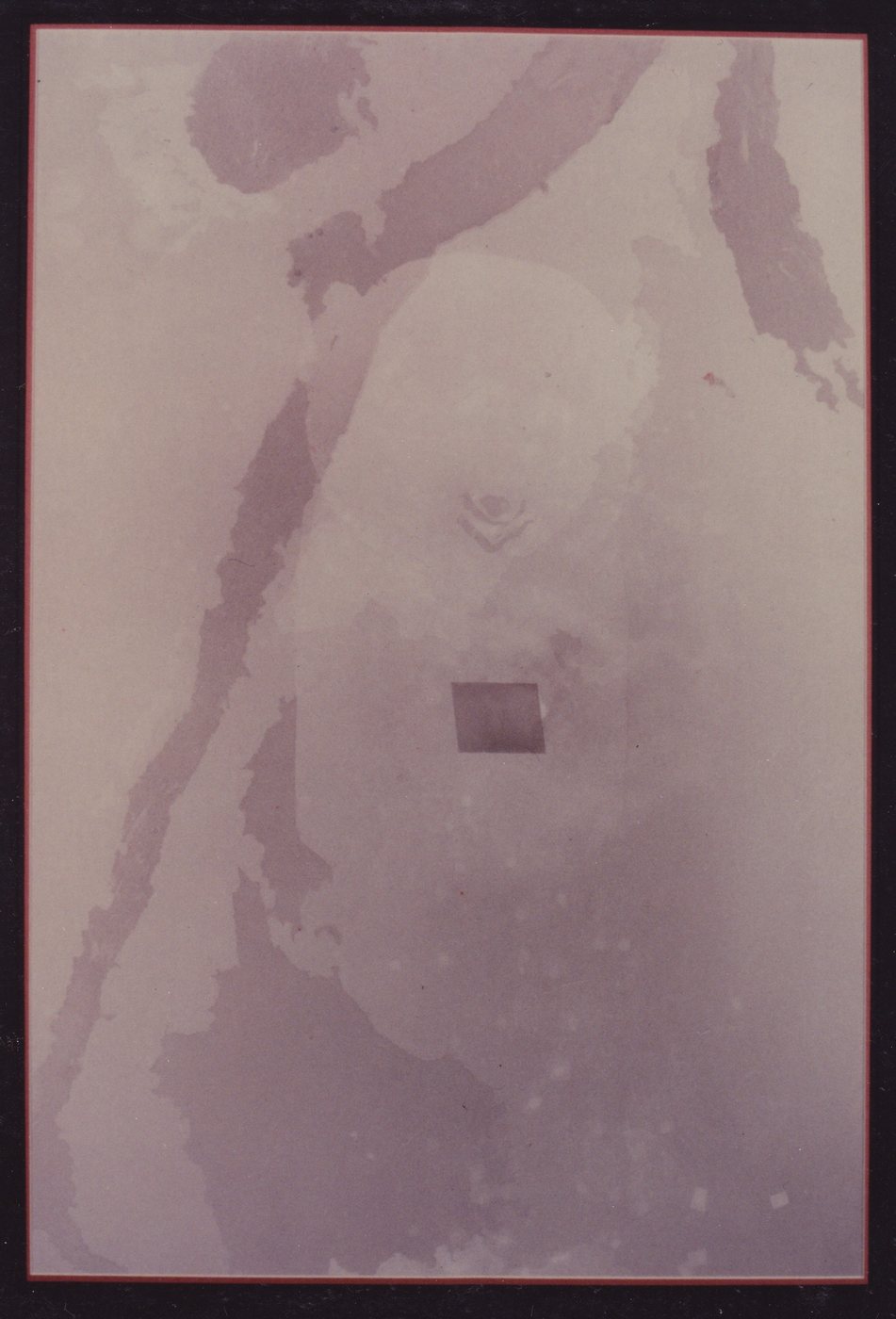God A,a, 1989 - a soft mauve wash in a black frame, a faint figure surfacing behind it and one small dark square held near the centre.